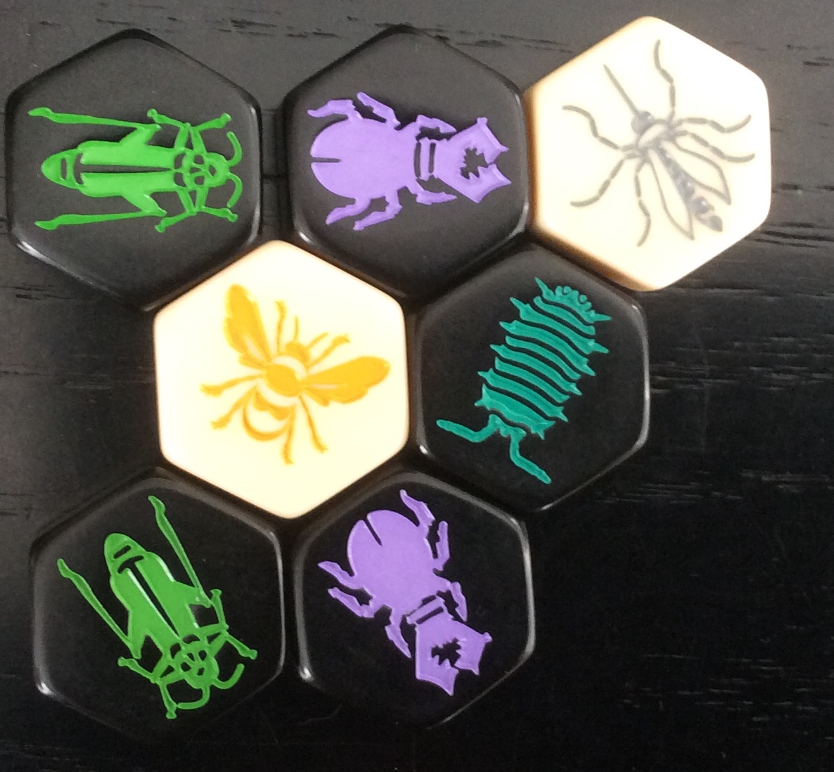 The cyan thing is the pill bug and the grey the mosquito